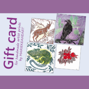 Gift card image showing a goat, a crow on a bench, a lizard and red rosehips on a purple background.