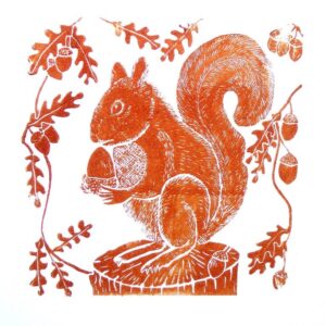A squirrel and oak leaves lino cut print in a warm brown single colour.